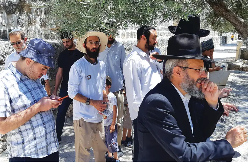 Jewish men pray at Temple Mount